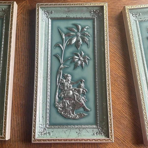four seasons vintage relief artwork by Metcalf